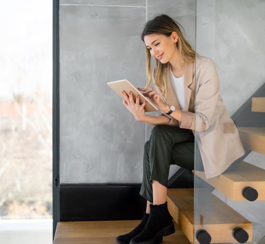 woman browsing on tablet