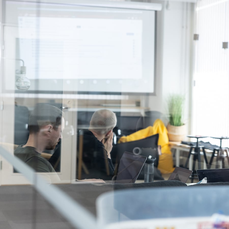 Image of Vaimo employees working in the office.