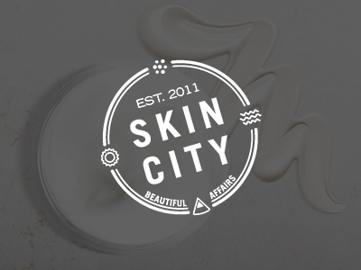 Skin City logo image