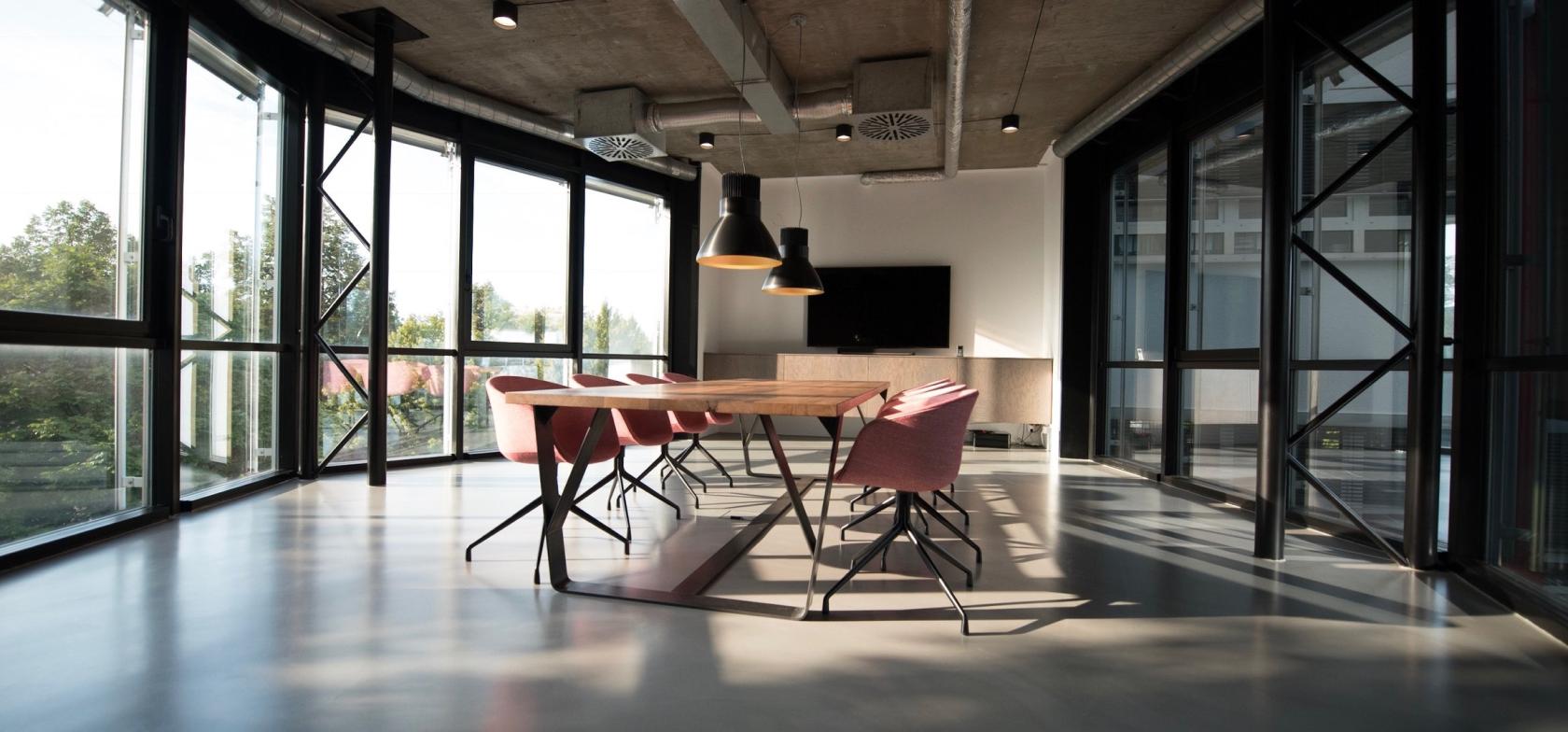 Image showing a conference room with warm light.