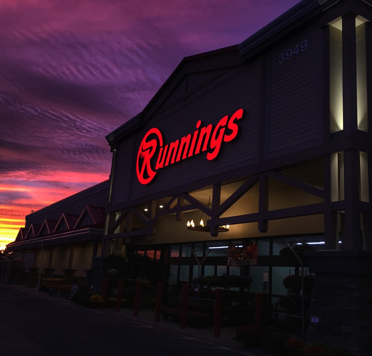 Image of Runnings store at night