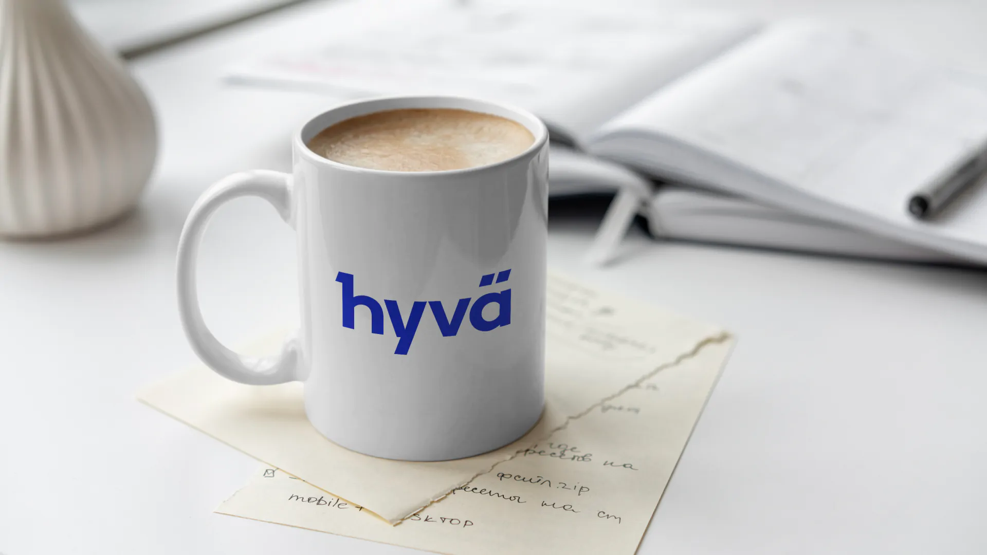 Image of coffee mug with "hyvä" on it