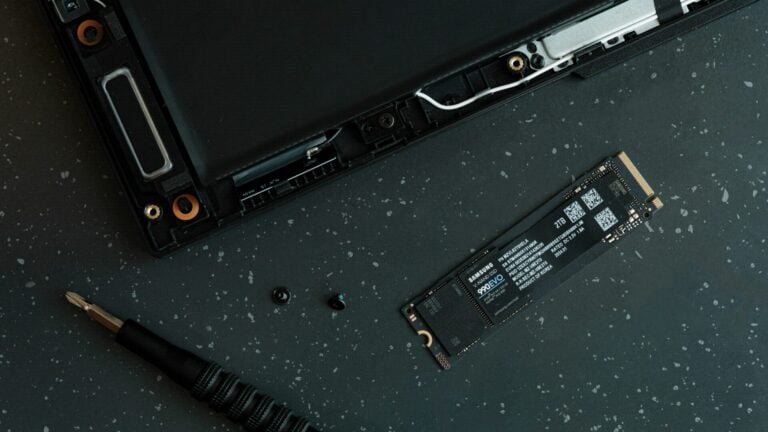 image of black laptop under repair