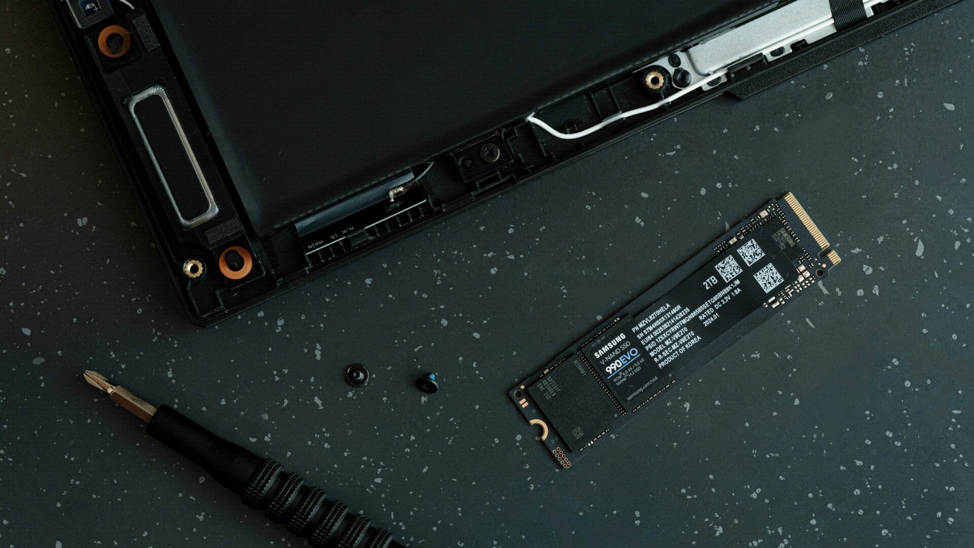image of black laptop under repair
